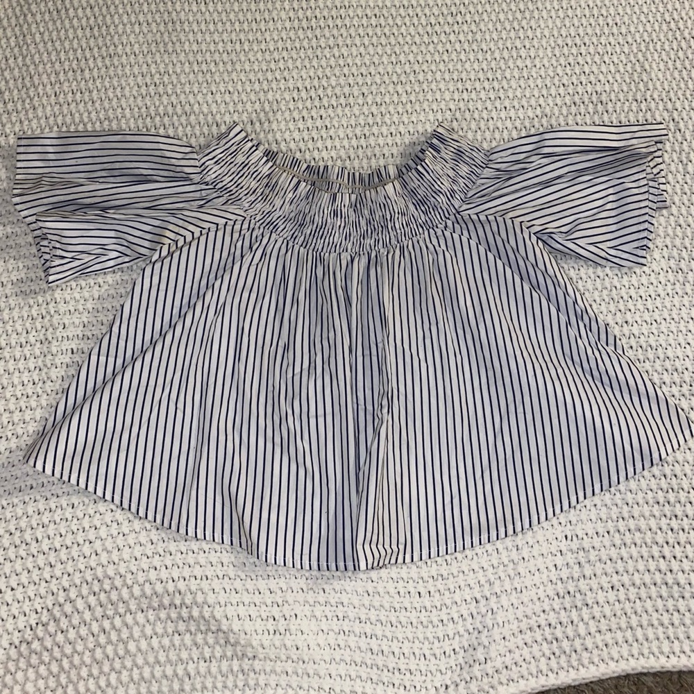 Women’s off the shoulder blouse size small. White and navy stripped